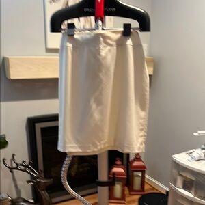 Mini Black Skirt with Pleats and Zipper Closure